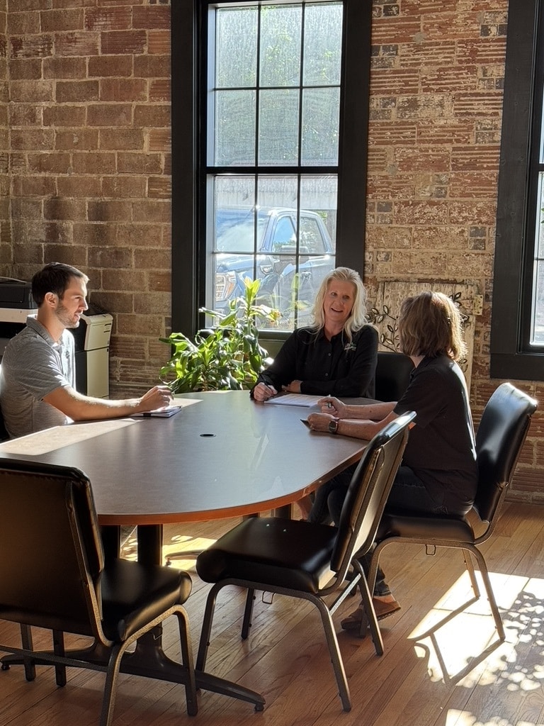 kdl team sitting at a table